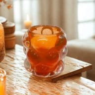   Piros domborúlencsés fényvarázs gyertya – Tölgy ámbra illattal